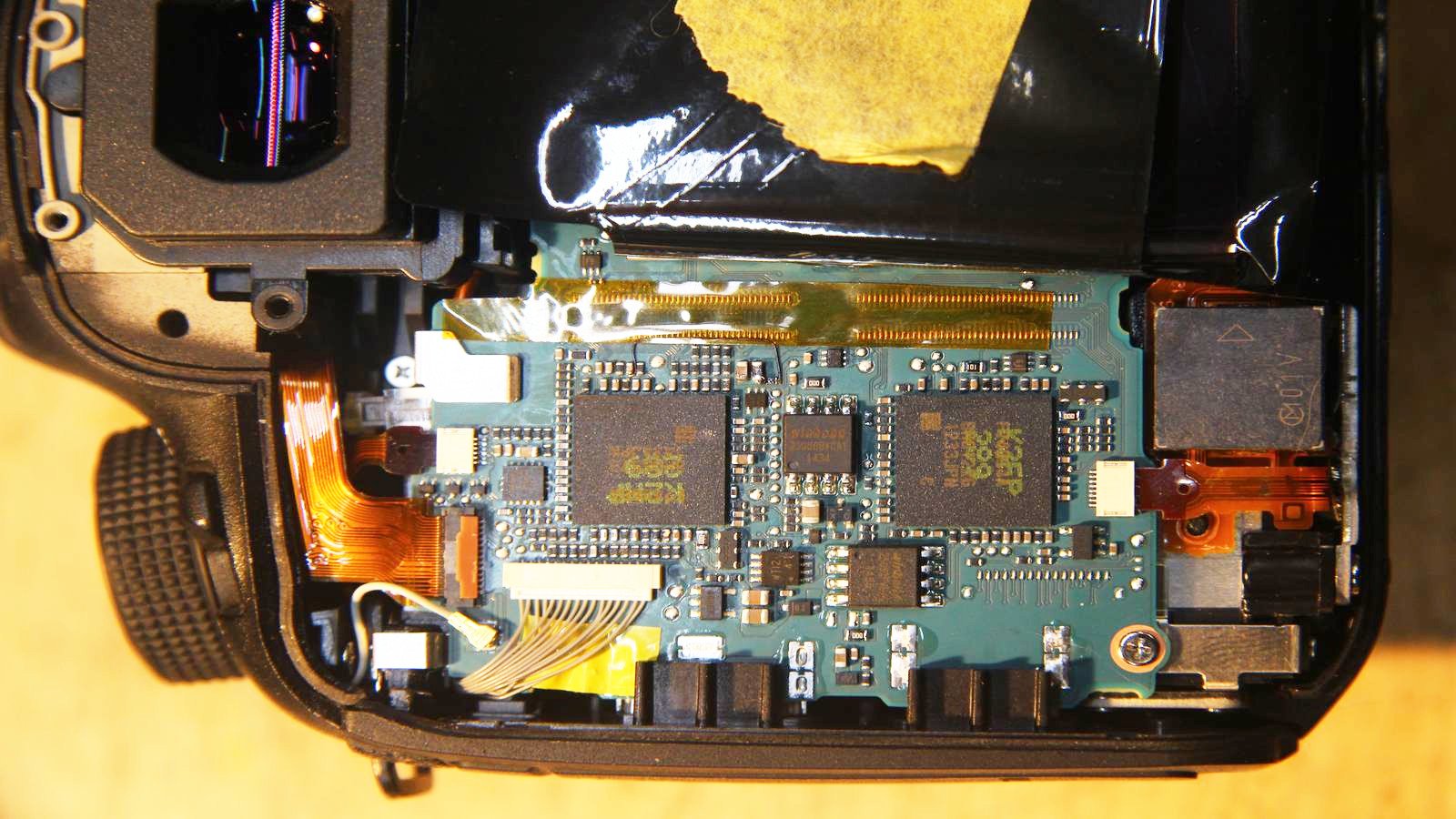 Patch wire temporarily secured, just above the left IC